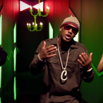 Nicki Minaj featuring Cam’ron dans “I Am Your Leader”