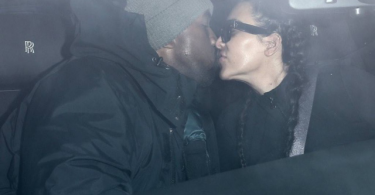 Kim Kardashian and Kanye West kissing