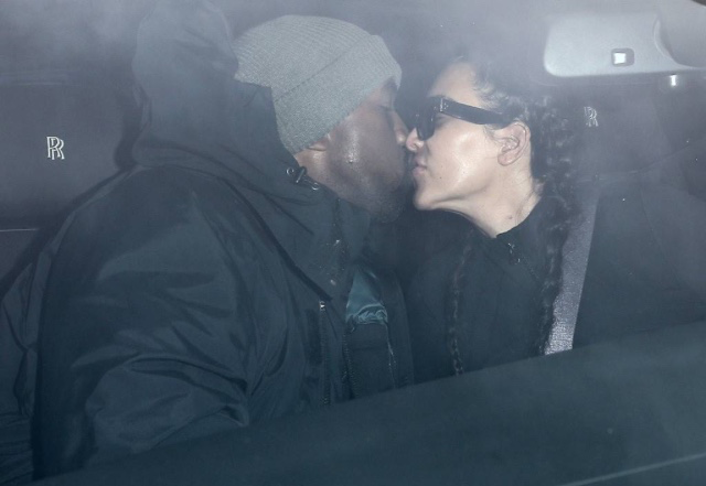 Kim Kardashian and Kanye West kissing