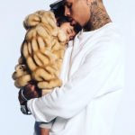 Chris Brown puts his daughter Royalty’s face on his back
