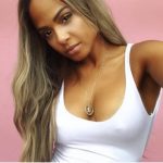 Christina Milian wearing white Pretty Little Thing outfit during a photoshoot