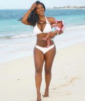 Kenya Moore is a happy mother